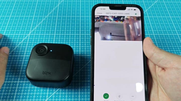 Blink camera live feed on smartphone screen Blink camera live feed on smartphone screen
