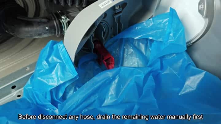 Blue bag catches draining water Blue bag catches draining water