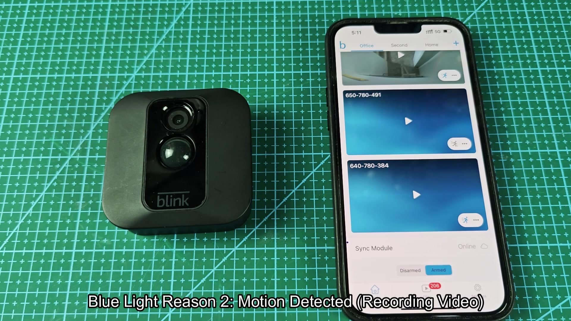 Camera beside app showing video entries Camera beside app showing video entries