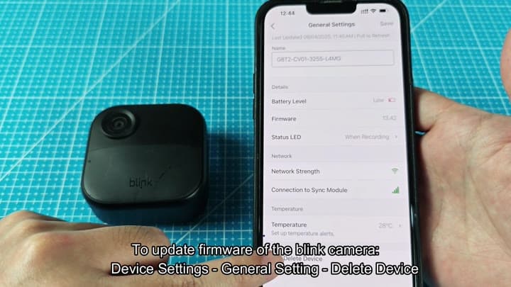 Camera next to phone showing firmware version Camera next to phone showing firmware version