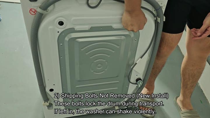 Checking rear panel for shipping bolts Checking rear panel for shipping bolts