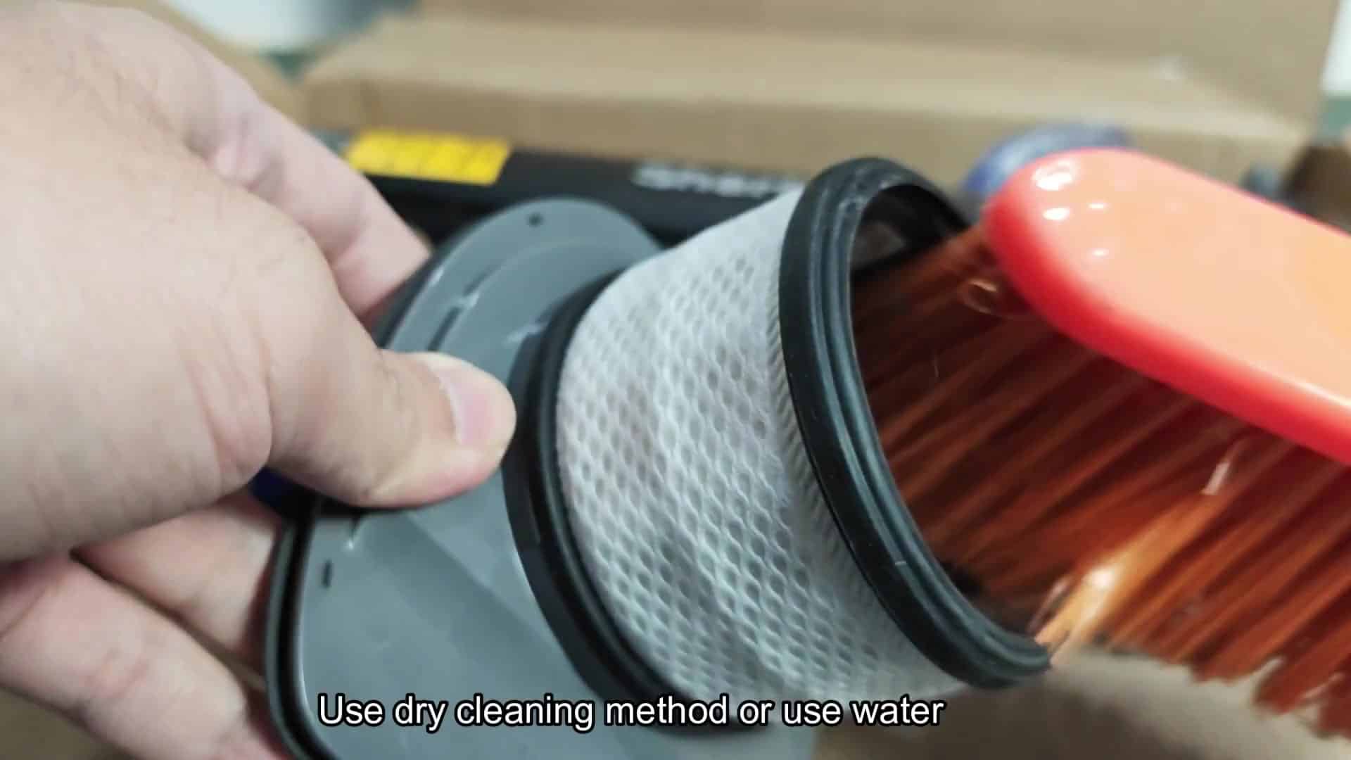 Close-up of filter text and brush cleaning Close-up of filter text and brush cleaning
