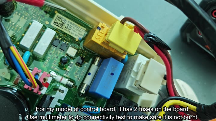 Control board with two white fuses Control board with two white fuses