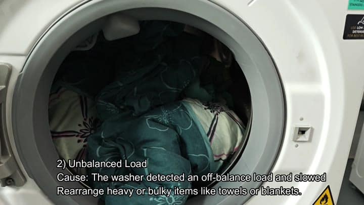 Dark laundry inside washing machine drum Dark laundry inside washing machine drum