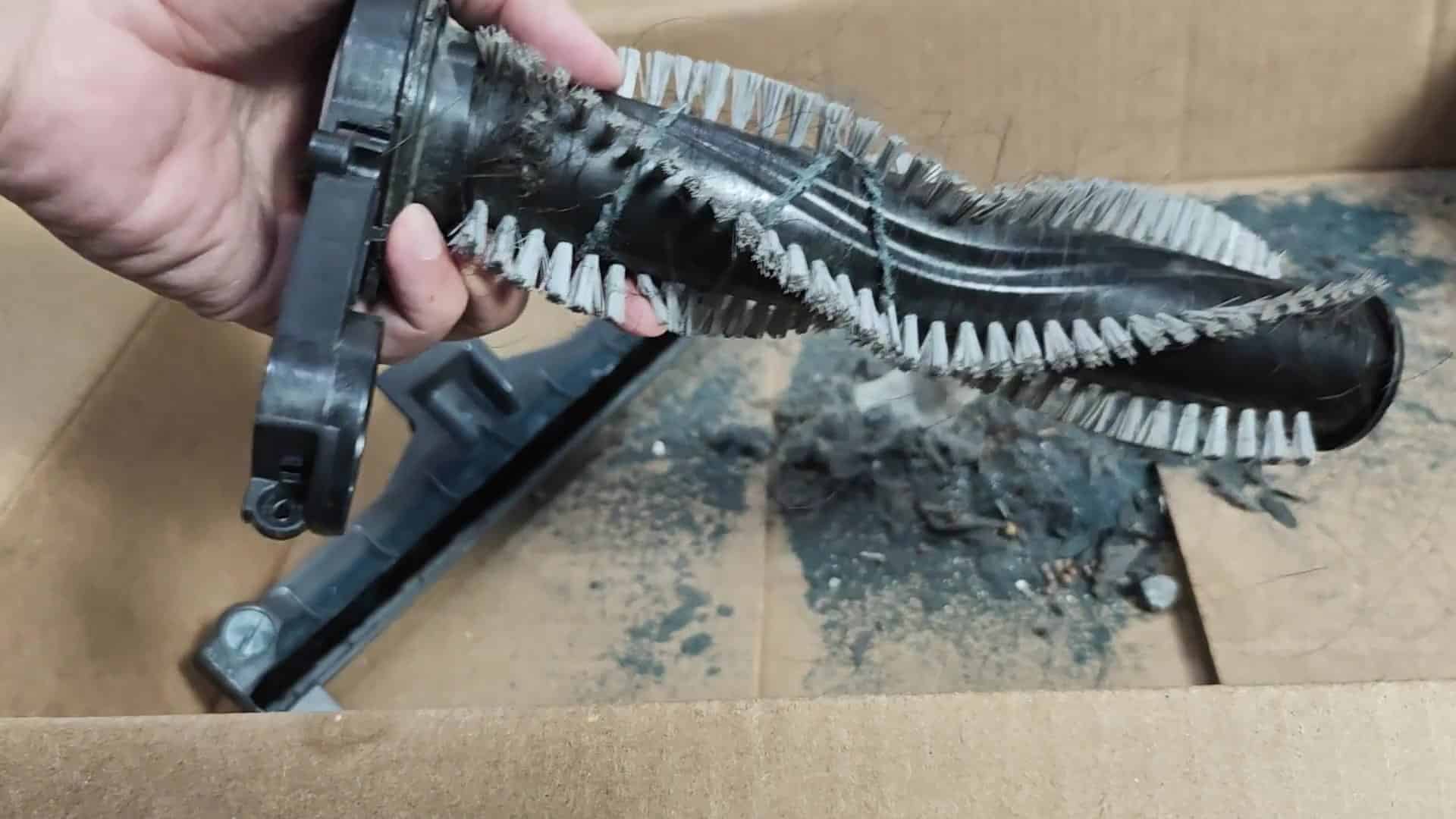 Dirty roller debris in cardboard box Dirty roller debris in cardboard box