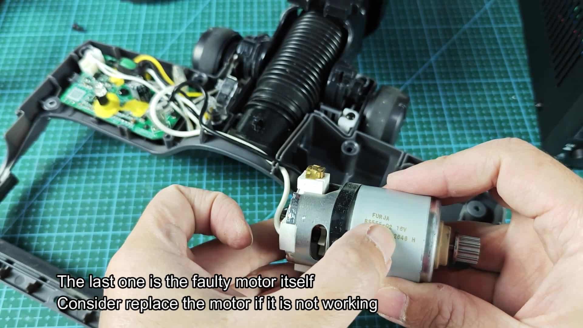 Disassembled vacuum head with faulty motor Disassembled vacuum head with faulty motor