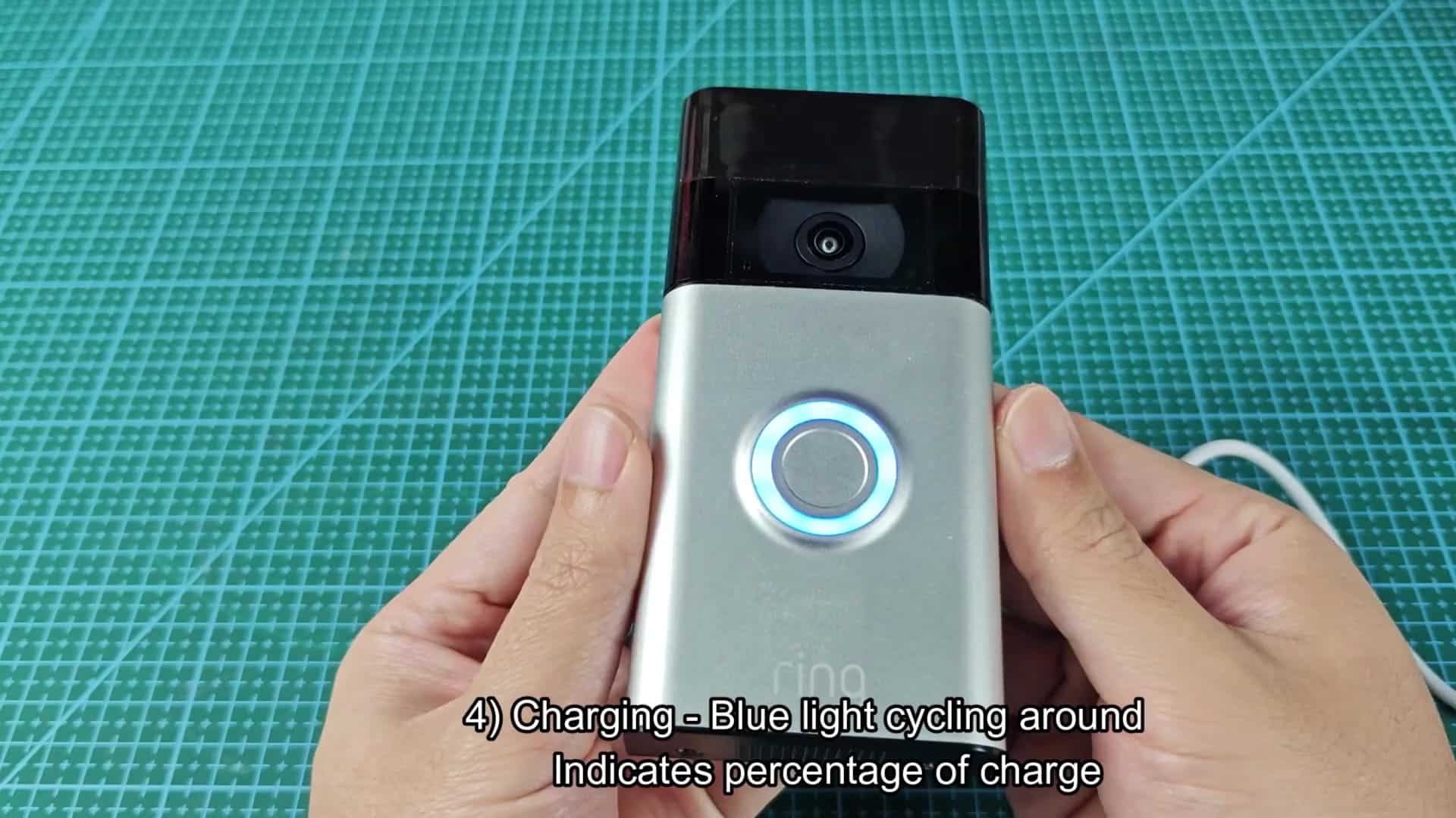 Doorbell held while charging indicator glows Doorbell held while charging indicator glows