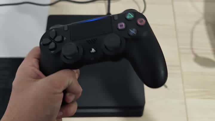DualShock 4 controller with blue light DualShock 4 controller with blue light