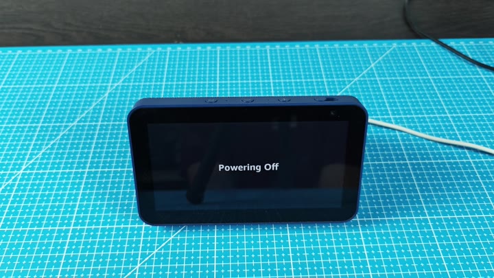 Echo Show screen showing Powering Off Echo Show screen showing Powering Off