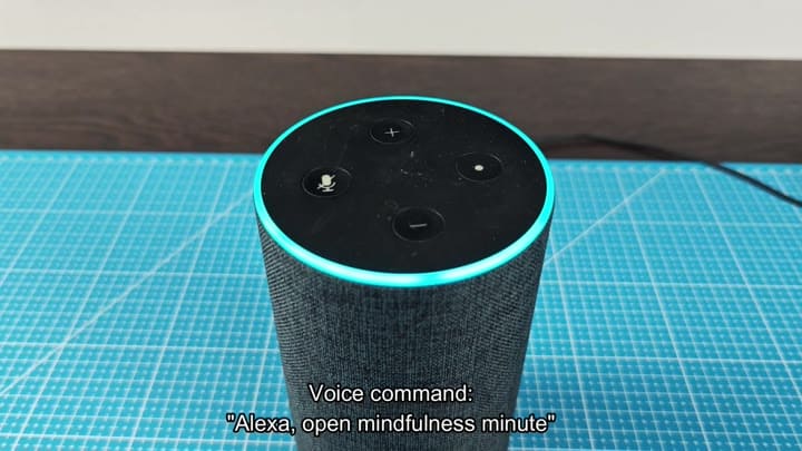 Echo speaker glowing blue listening Echo speaker glowing blue listening