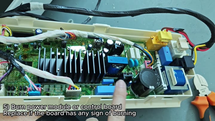 Examining control board components Examining control board components