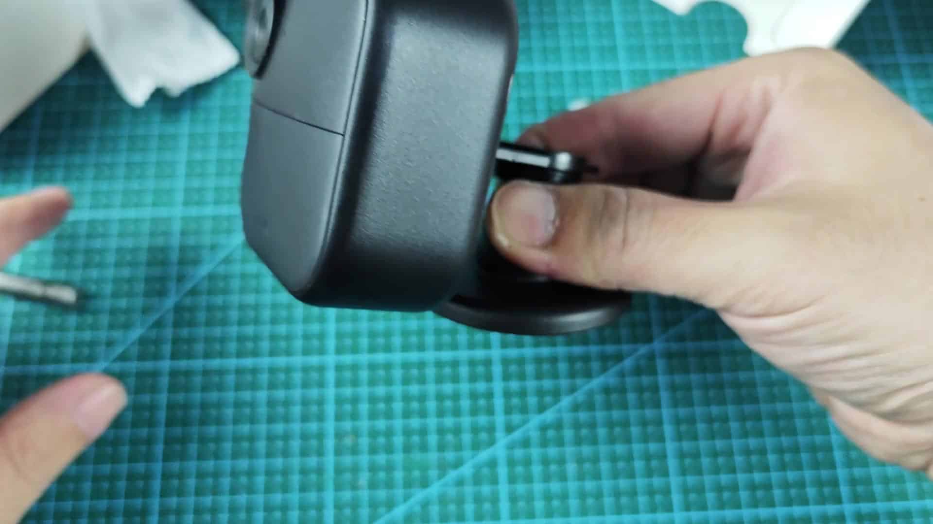 Flat tool inserted into mounting release slot Flat tool inserted into mounting release slot