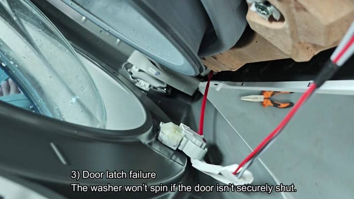 Front loading door latch mechanism Front loading door latch mechanism
