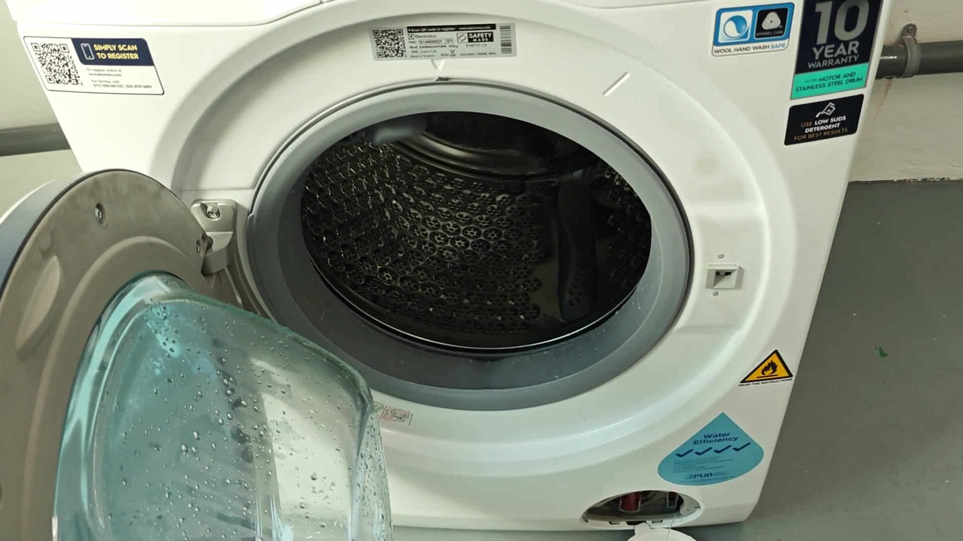 Fully open washer drum revealing interior Fully open washer drum revealing interior