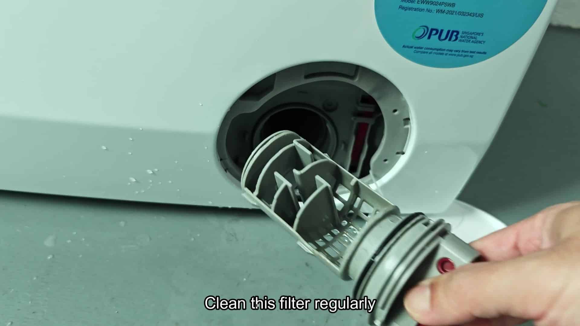 Gray plastic drain filter removed from port Gray plastic drain filter removed from port