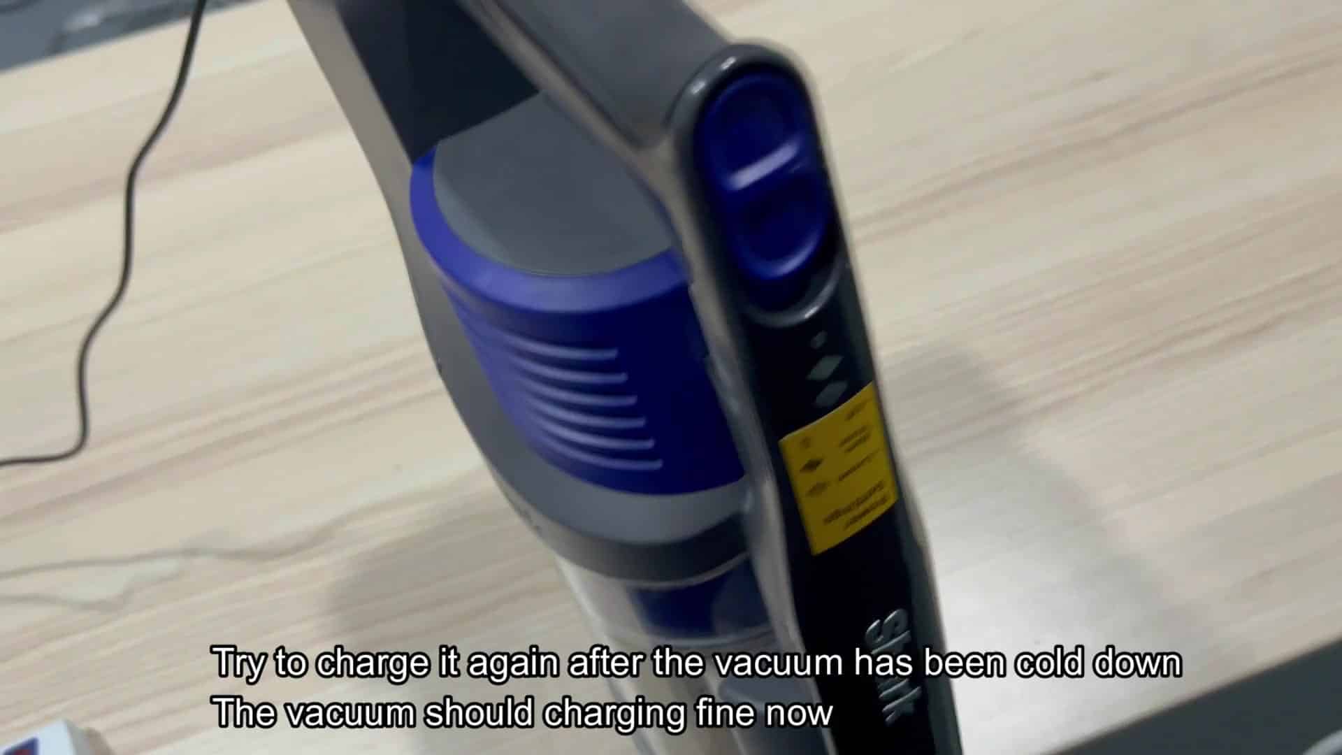 Handheld vacuum charging cable plugged in Handheld vacuum charging cable plugged in