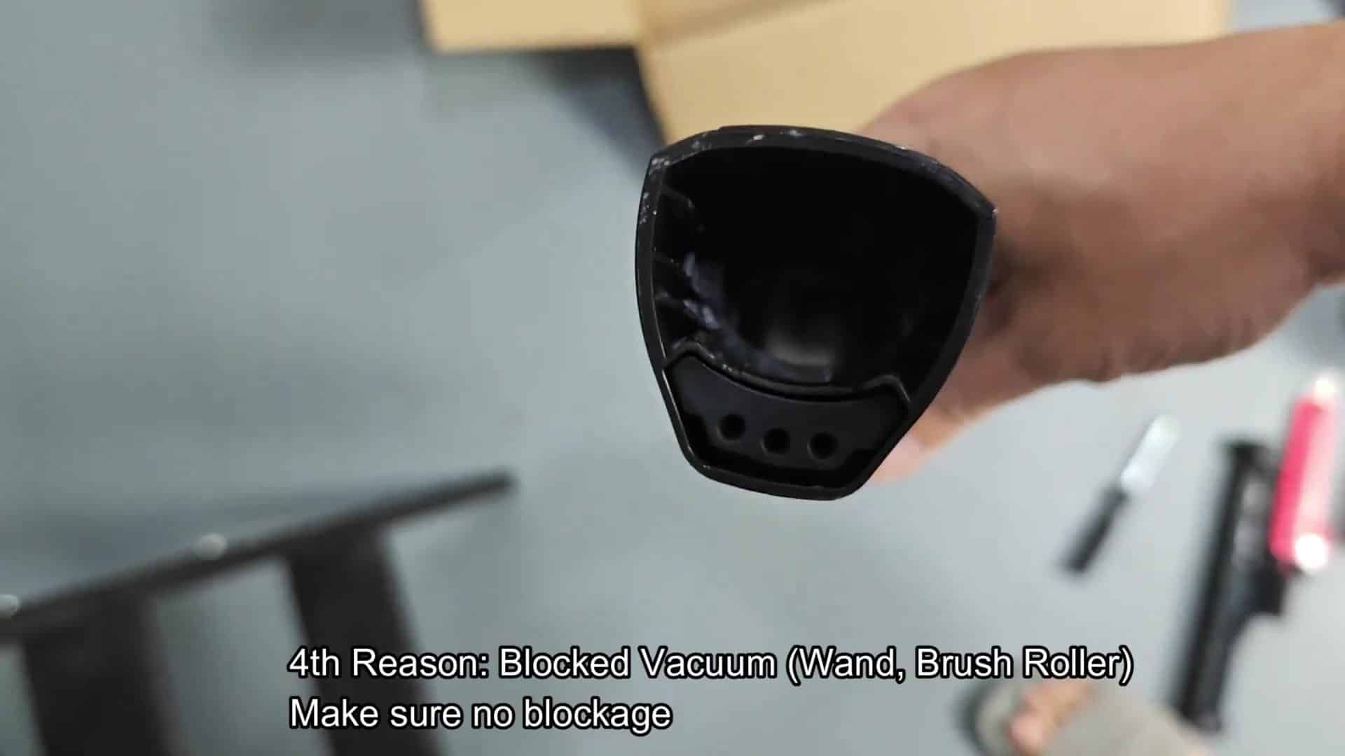Inspecting vacuum wand for blockages Inspecting vacuum wand for blockages