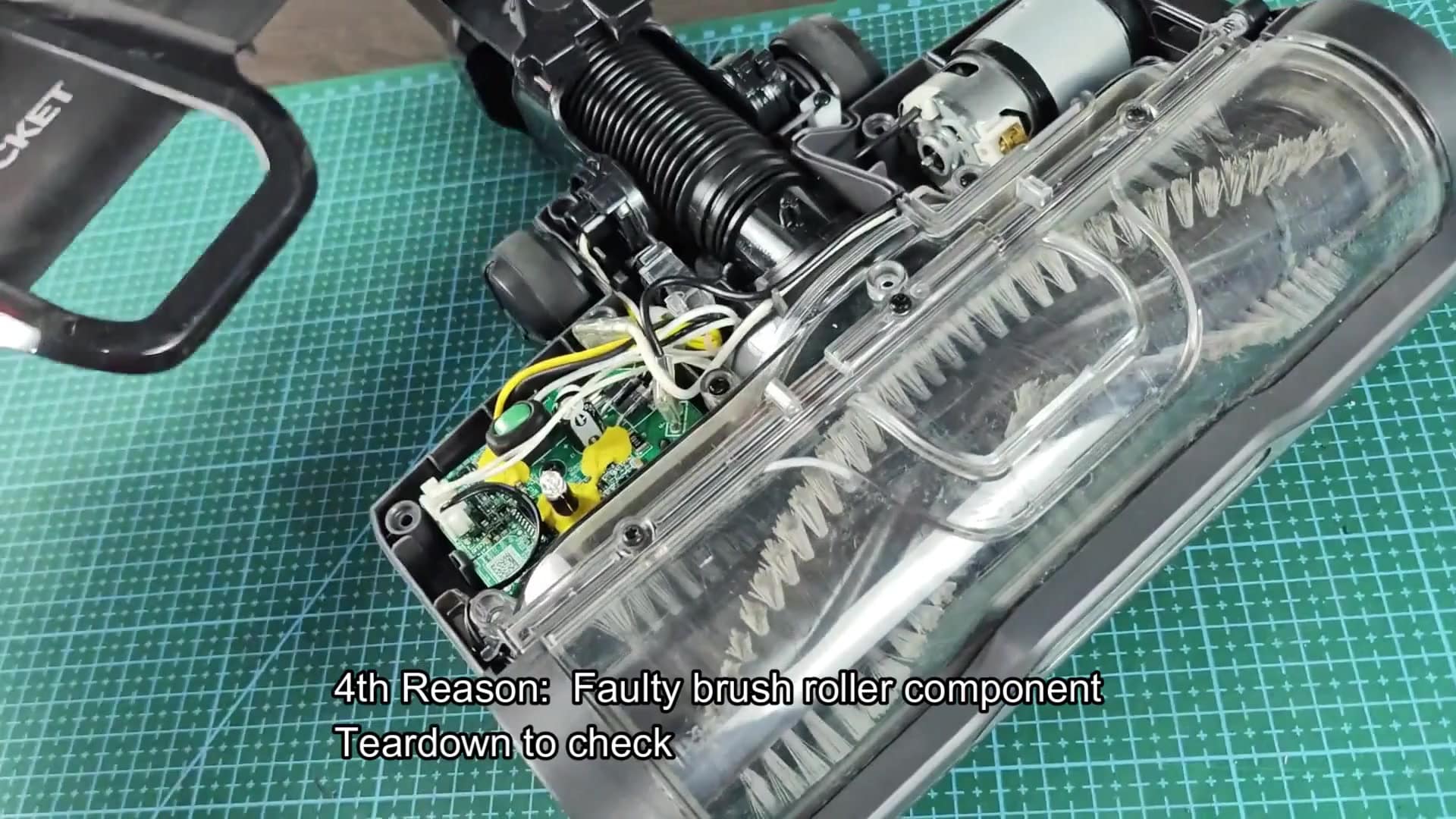 Internal view revealing brush roller components Internal view revealing brush roller components