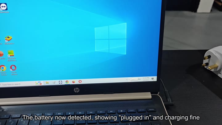 Laptop plugged in and charging normally Laptop plugged in and charging normally