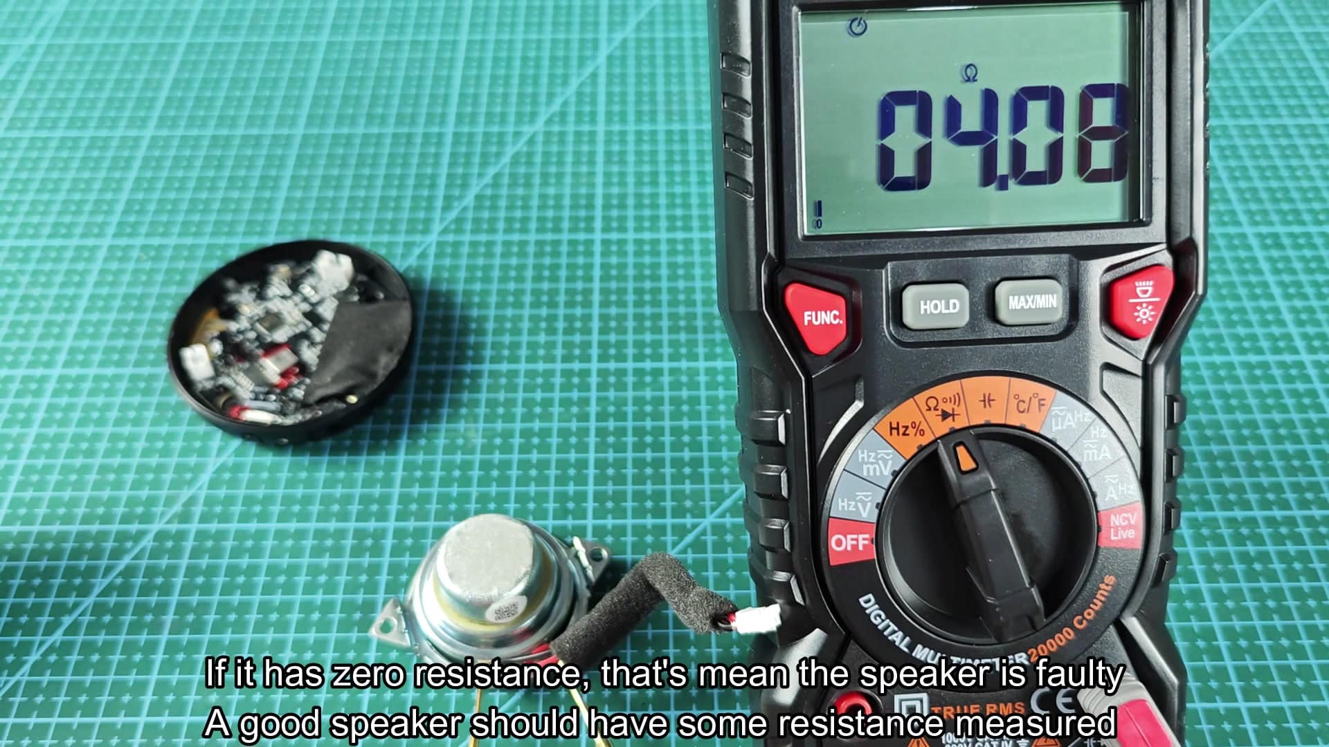 Measuring speaker resistance on work mat Measuring speaker resistance on work mat