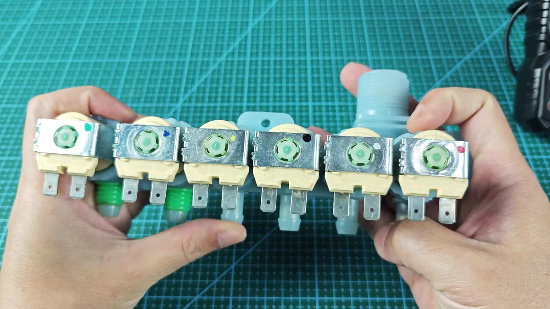 Metal solenoid sections with electrical terminals Metal solenoid sections with electrical terminals