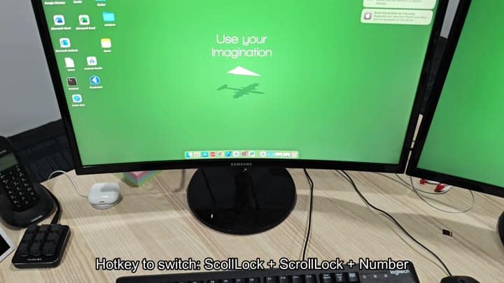 Monitor showing desktop with switching hotkey tip Monitor showing desktop with switching hotkey tip