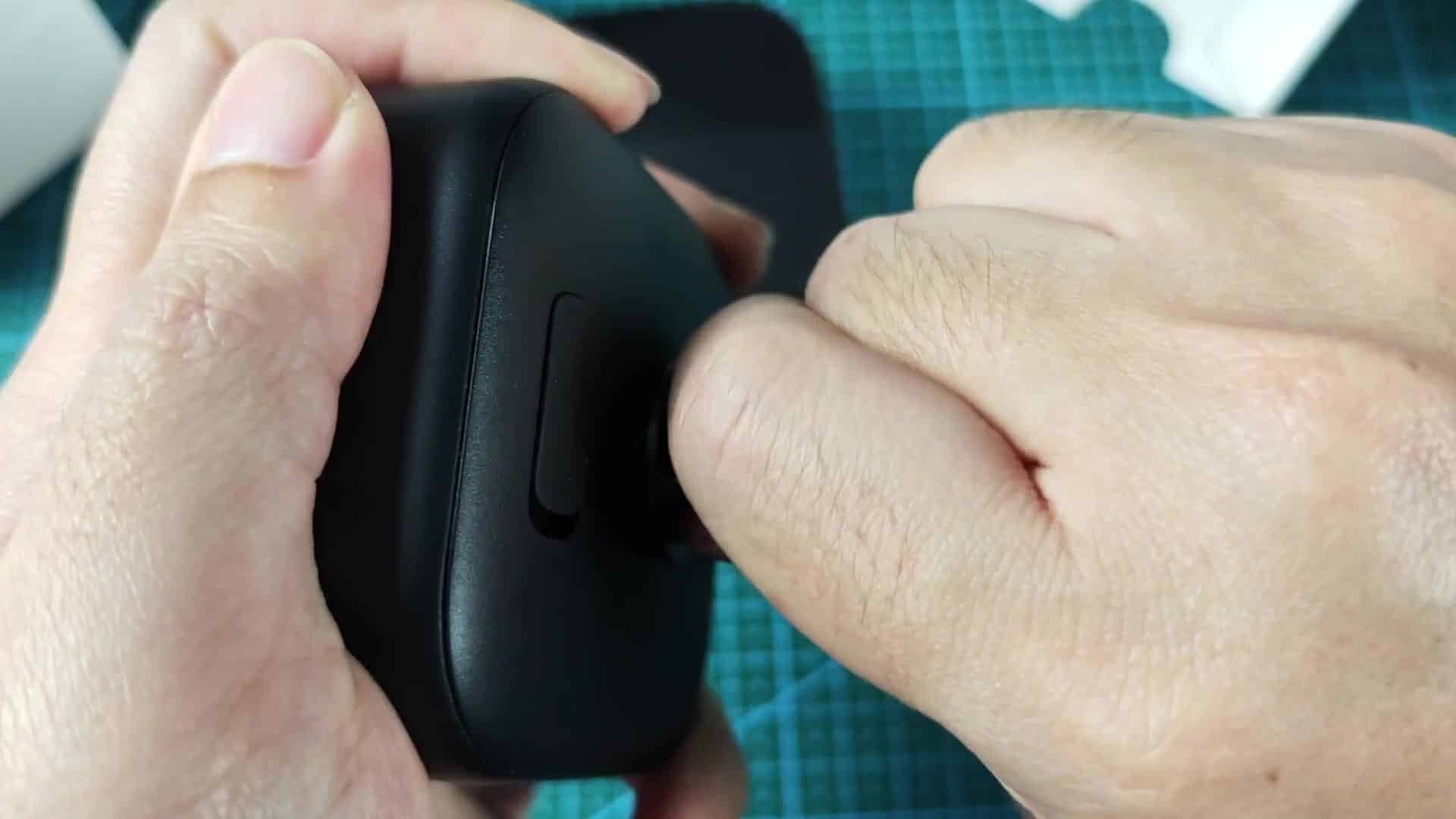 Mounting arm extended from device side slot Mounting arm extended from device side slot