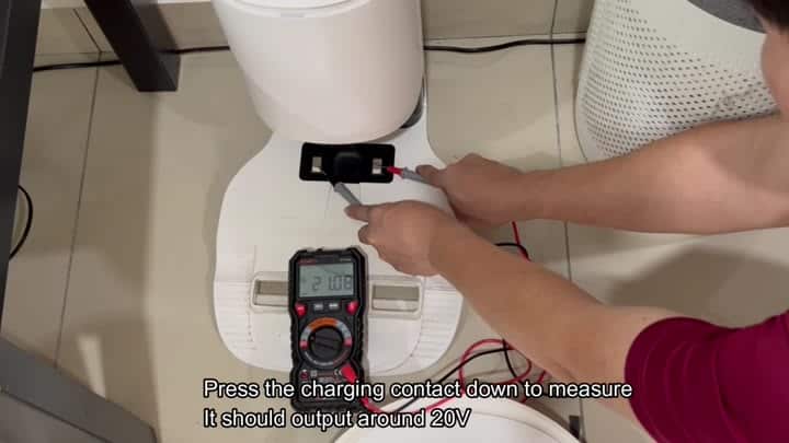 Multimeter reads 21.08V on charging contacts Multimeter reads 21.08V on charging contacts