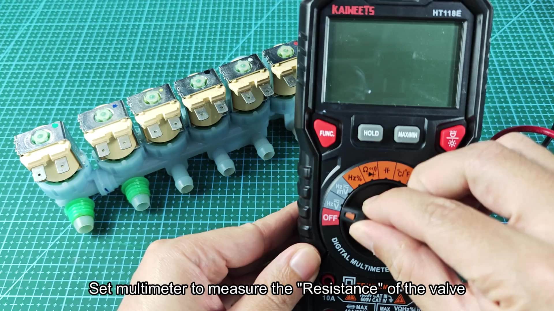 Multimeter set to measure resistance mode Multimeter set to measure resistance mode