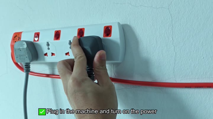 Plug inserted into wall power strip Plug inserted into wall power strip