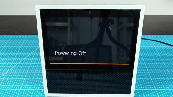 Powering Off with orange progress bar Powering Off with orange progress bar
