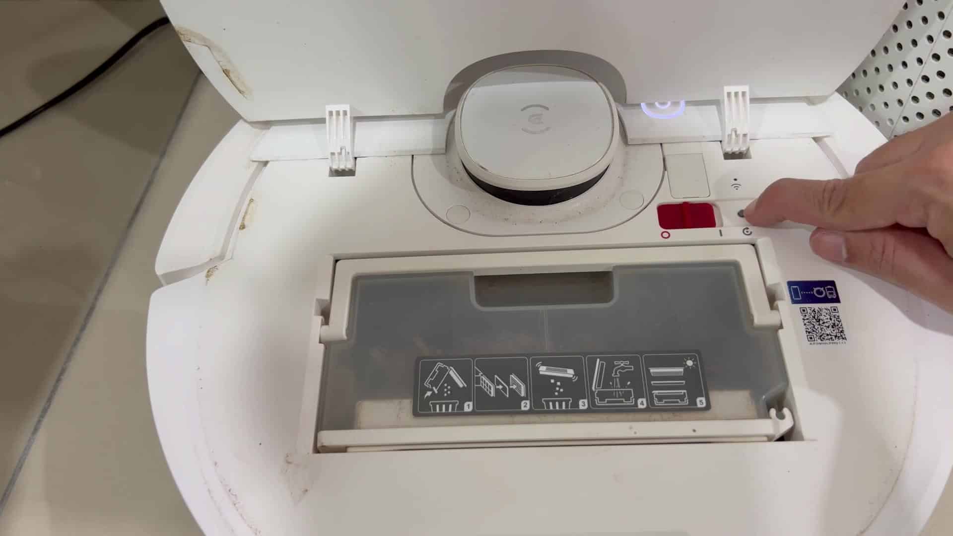 Pressing button near red indicator light Pressing button near red indicator light