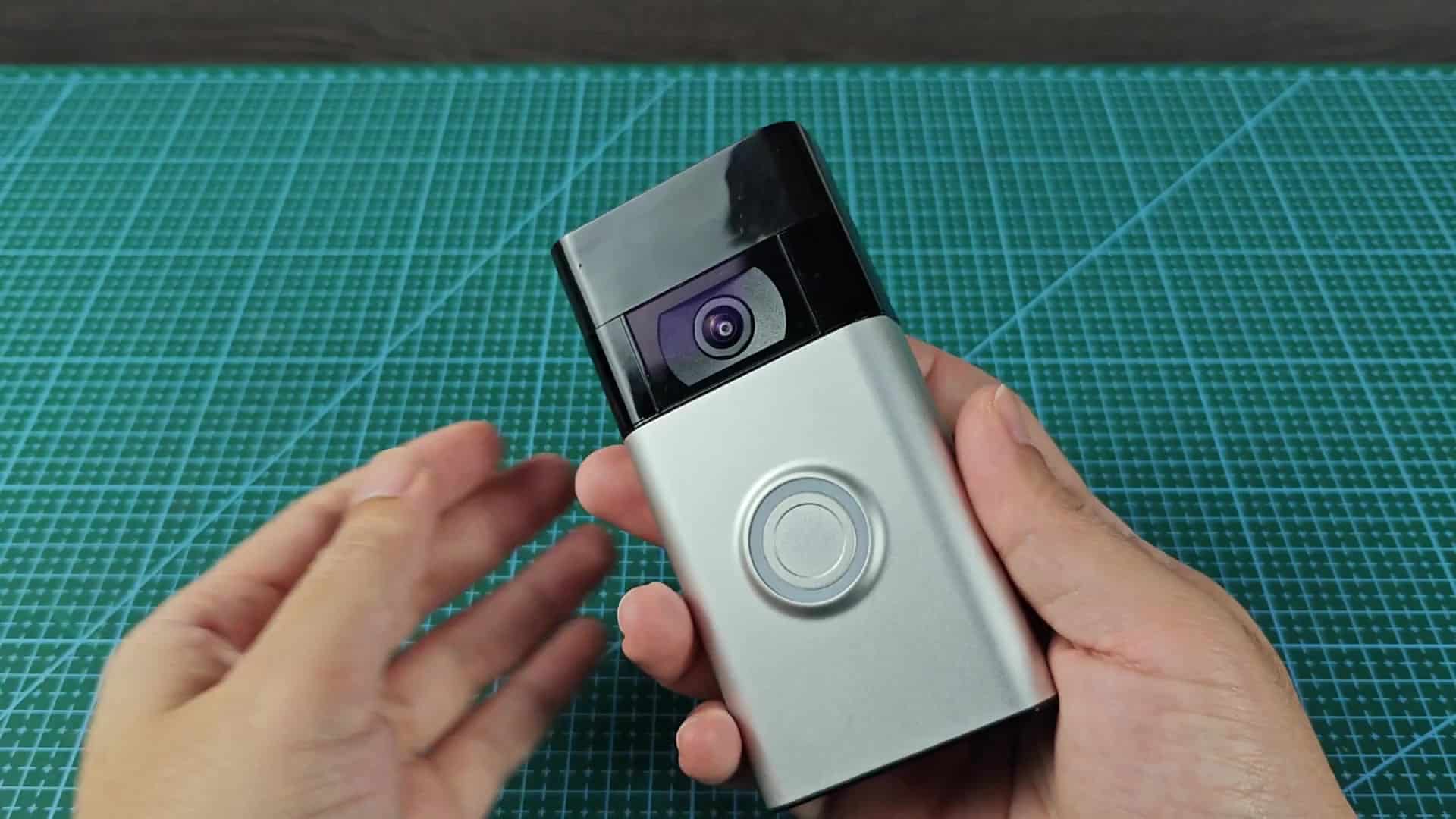 Pressing orange button on device back Pressing orange button on device back