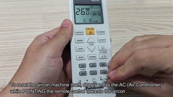 Pressing reset button on white remote Pressing reset button on white remote