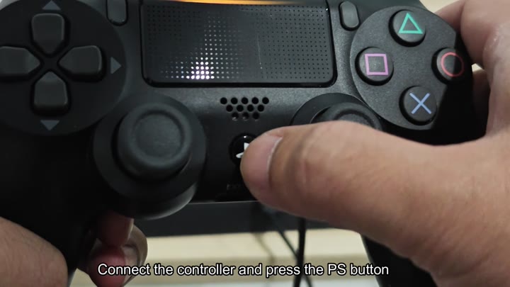 Pressing the PS button on controller Pressing the PS button on controller