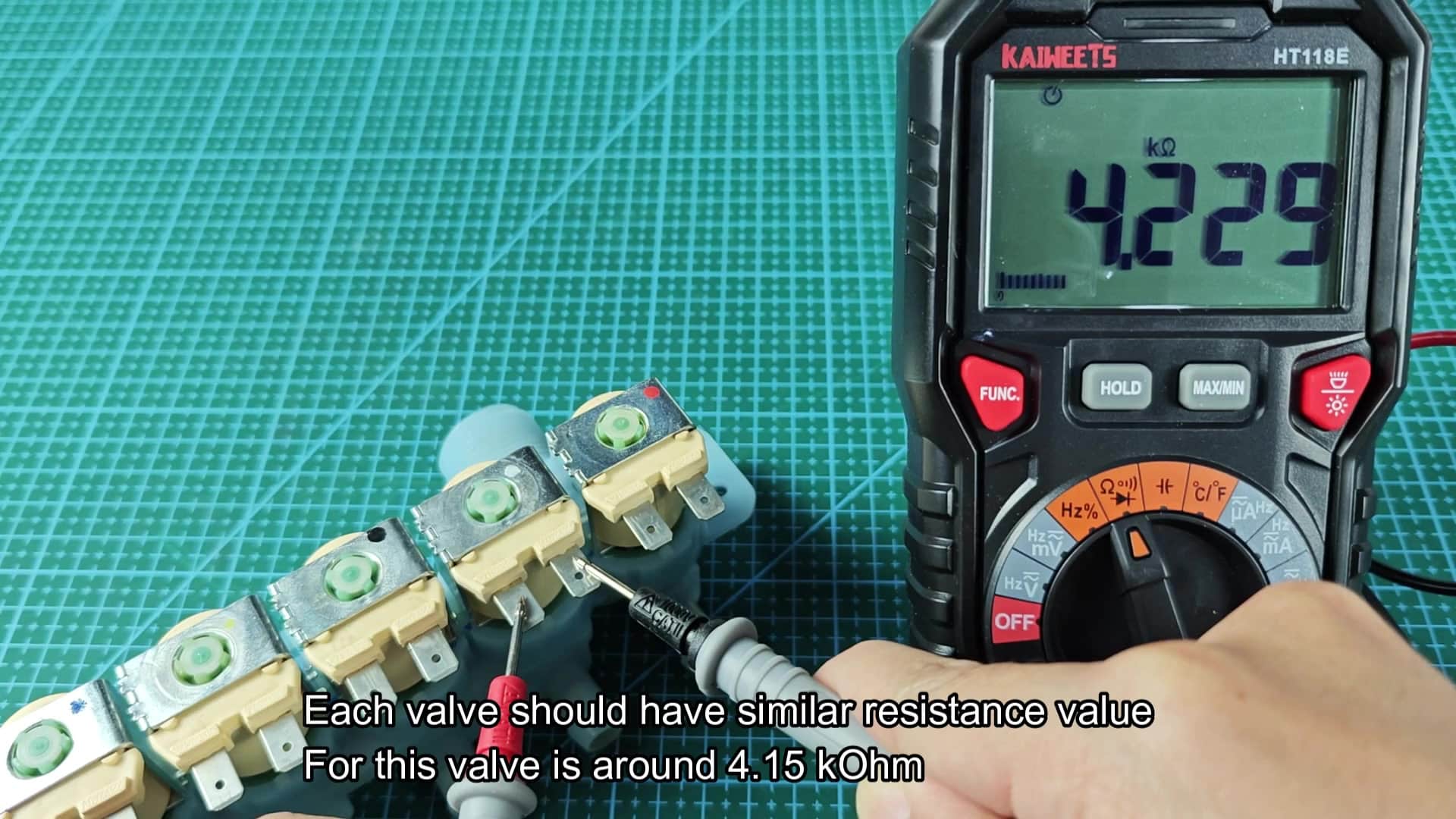 Probes touch solenoid terminal strip for reading Probes touch solenoid terminal strip for reading