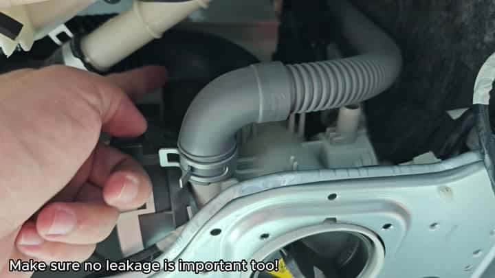 Reattaching hose to drain pump unit Reattaching hose to drain pump unit