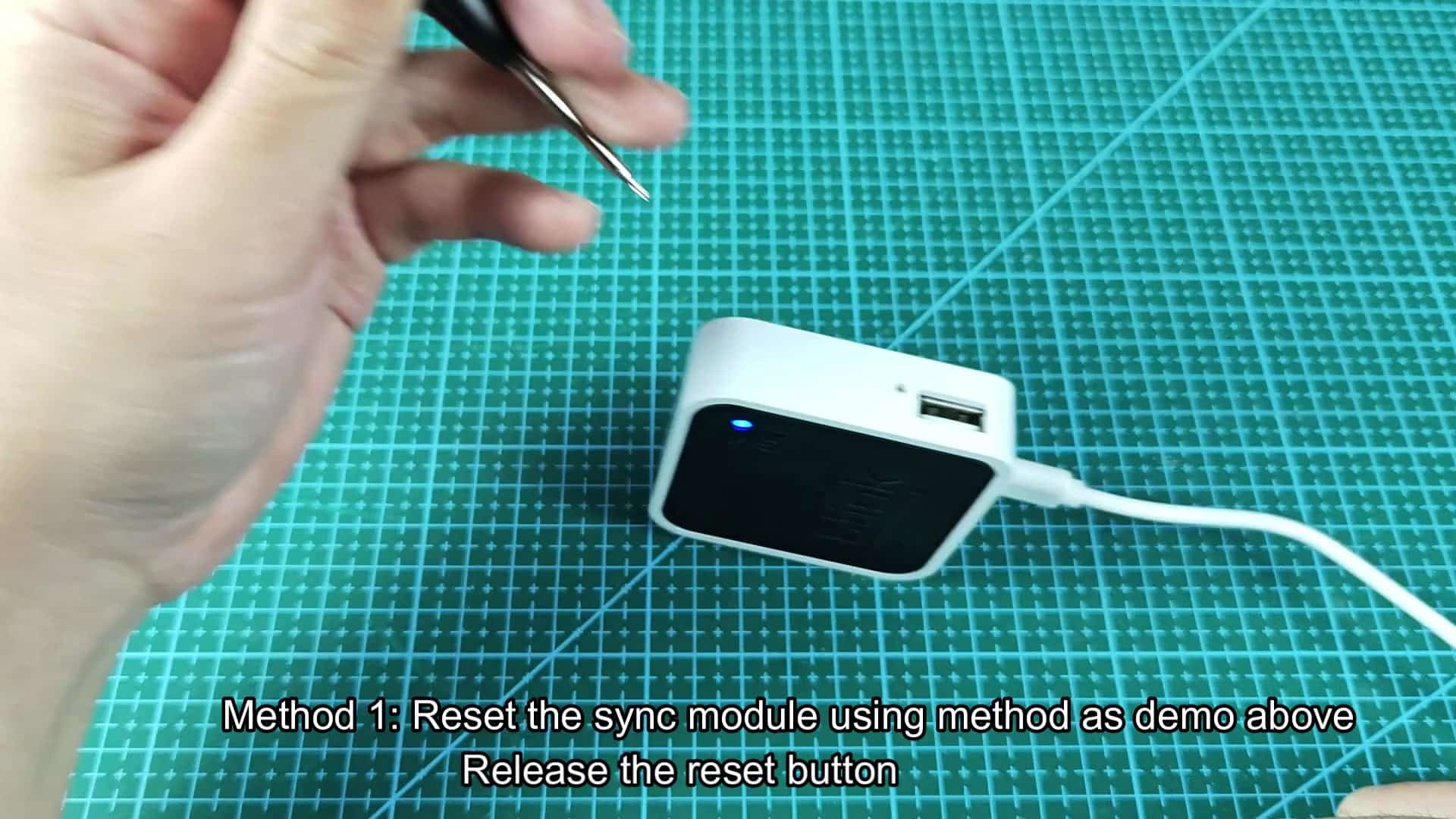 Releasing the reset button on device Releasing the reset button on device
