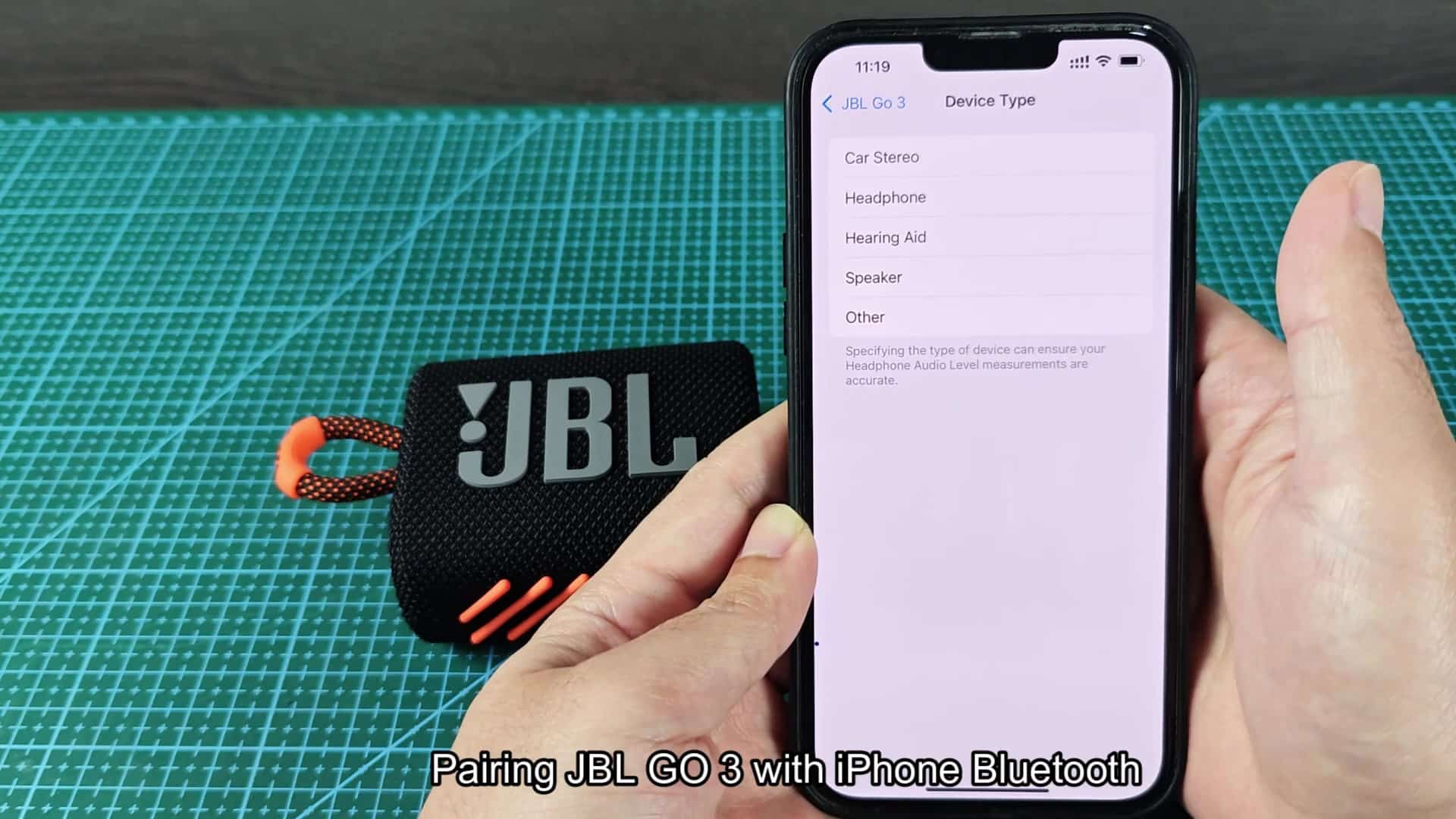 Selecting speaker type on iPhone screen Selecting speaker type on iPhone screen