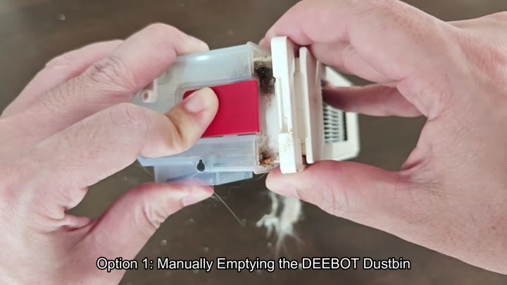Separating dustbin components to reveal debris Separating dustbin components to reveal debris