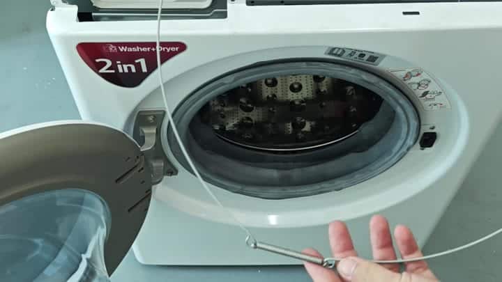 Spring attached to washer drum Spring attached to washer drum