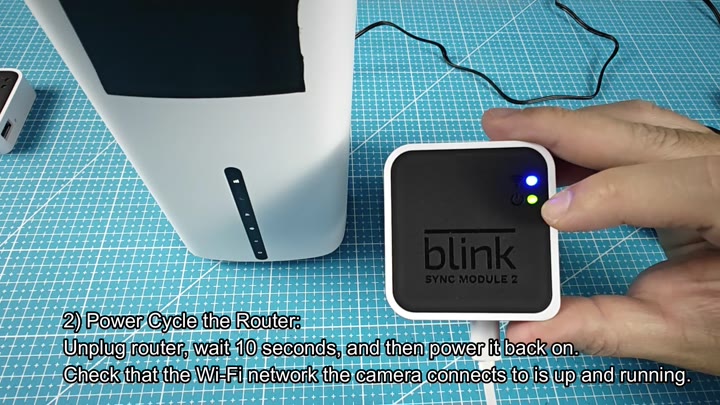 Sync Module 2 next to white router Sync Module 2 next to white router