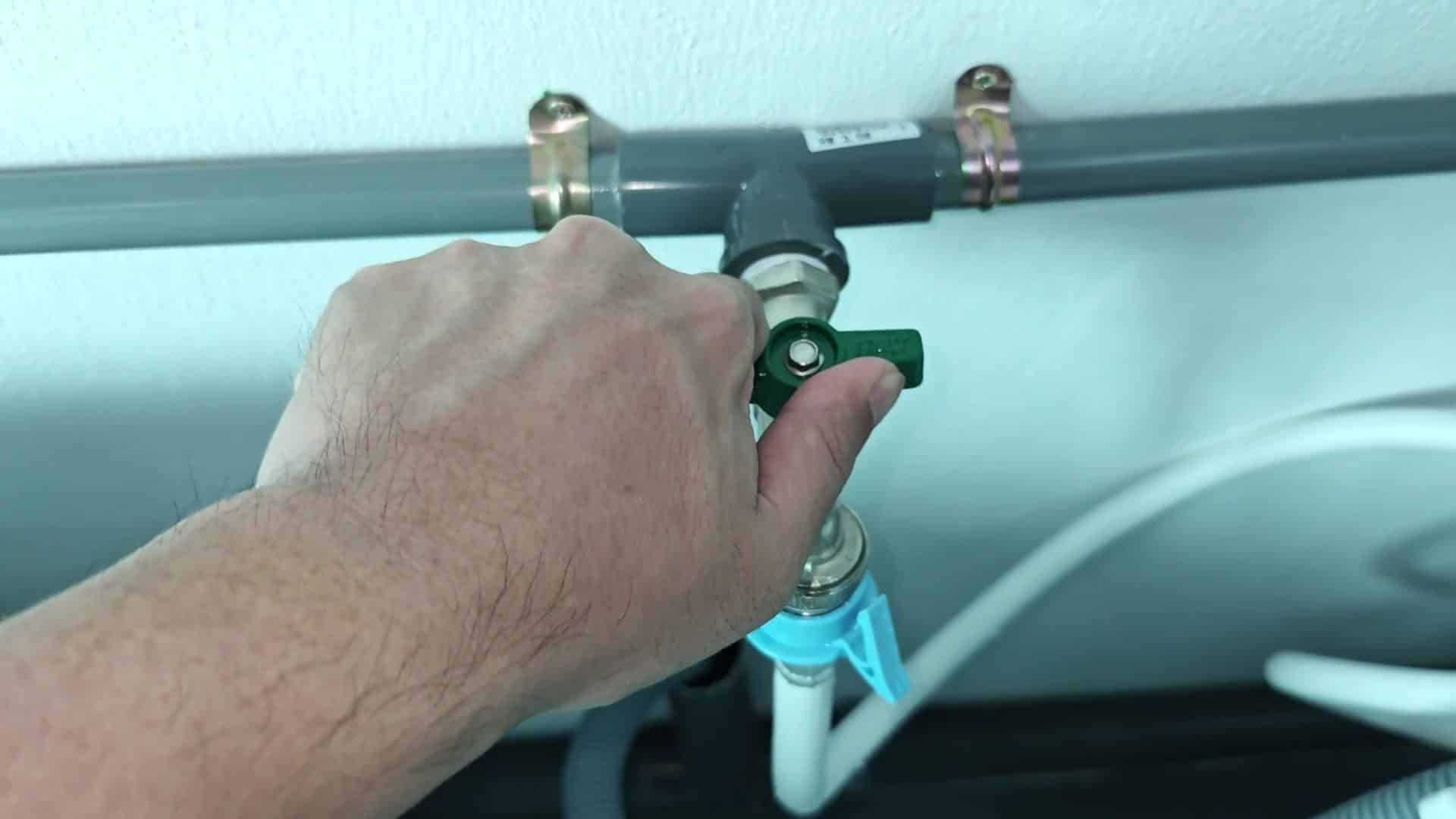 Turning green shutoff valve handle Turning green shutoff valve handle