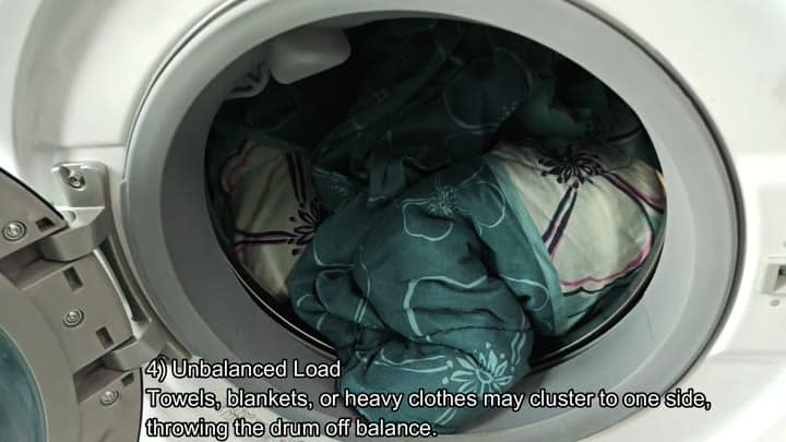 Unbalanced load of dark textiles inside Unbalanced load of dark textiles inside
