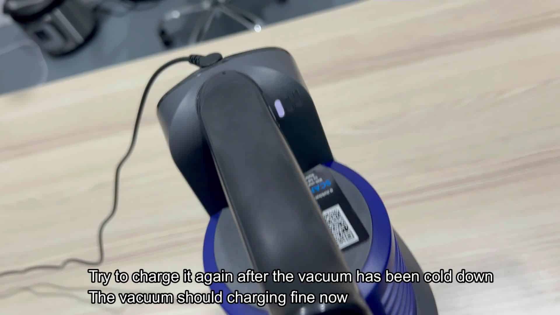 Upright vacuum docked for charging Upright vacuum docked for charging