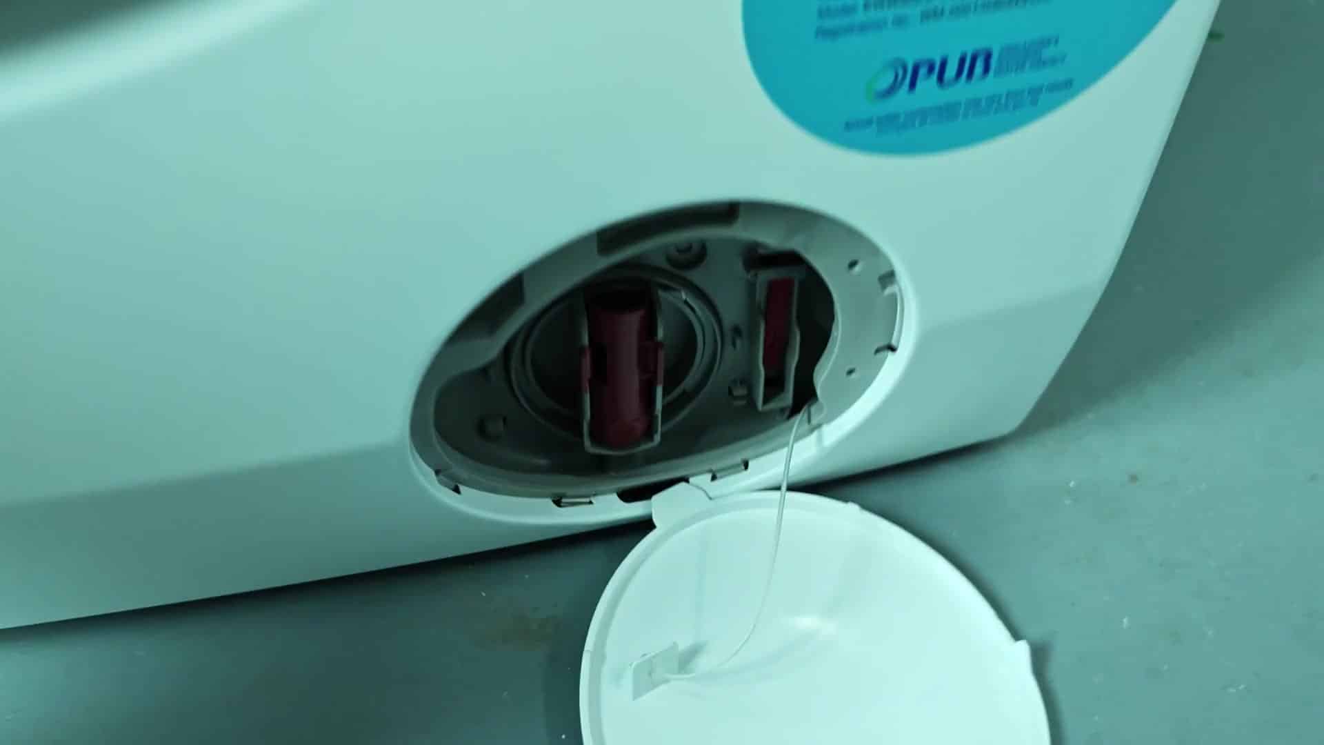 Washer door window with water inside drum Washer door window with water inside drum
