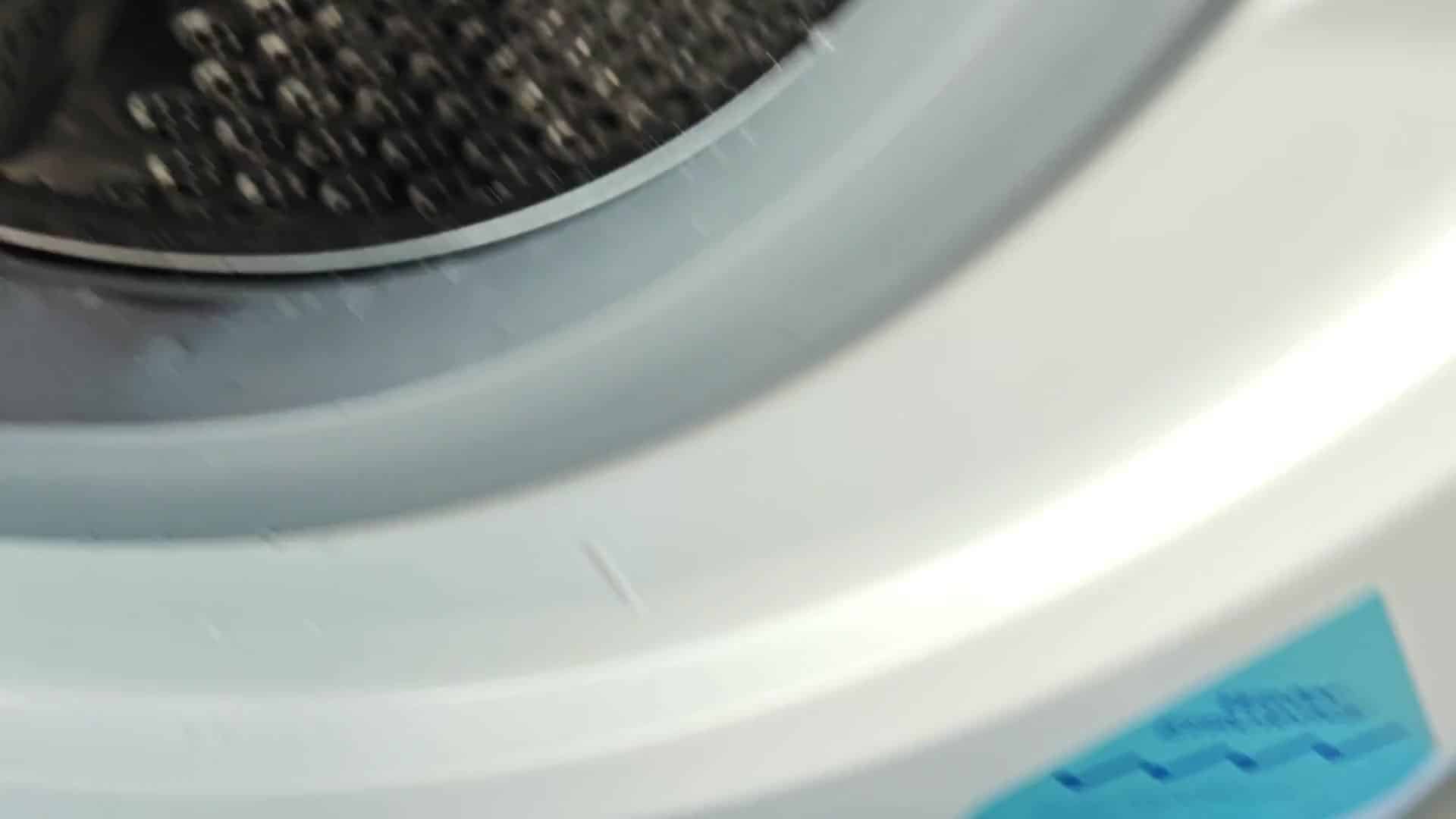 Water efficiency label and drain spout Water efficiency label and drain spout