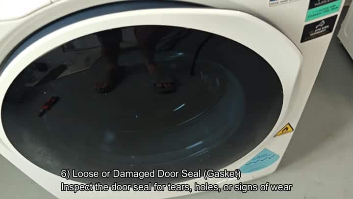 White front loader washer door with reflection White front loader washer door with reflection