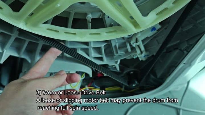 Worn drive belt inside washing machine Worn drive belt inside washing machine