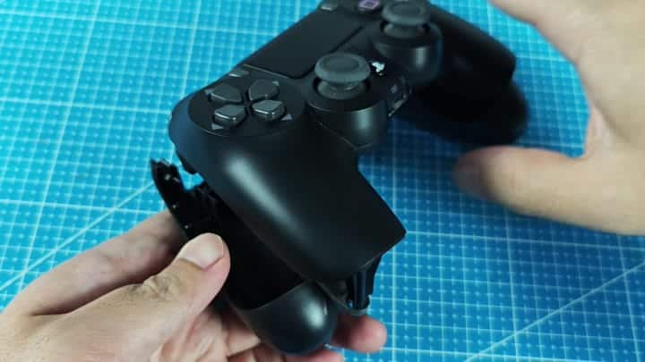 Broken controller shell revealing internals Broken controller shell revealing internals